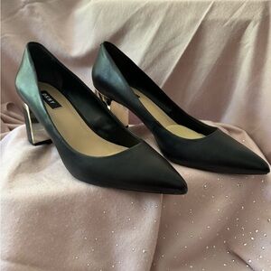 Two inch block heel.  DKNY.  Only worn once!